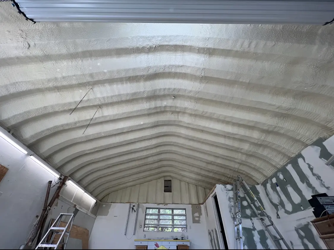 Spray polyurethane foam applied to the underside of a metal roof deck in Meridianville